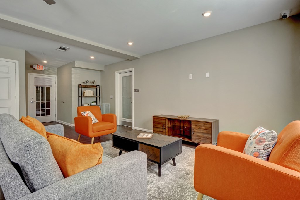 a living room with couches and a coffee table