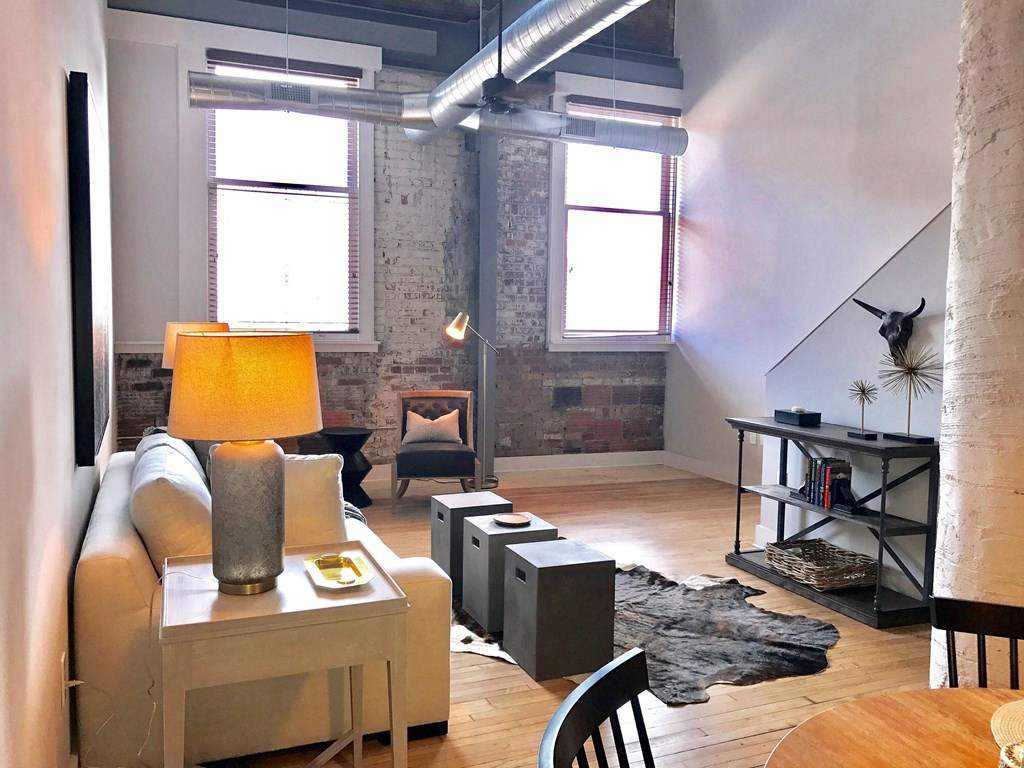 a living room with a couch and a table