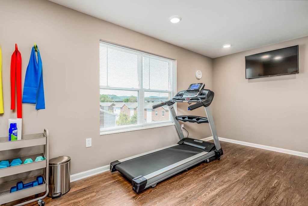 the apartments with resident amenities include a fitness center with treadmills and a flat screen tv