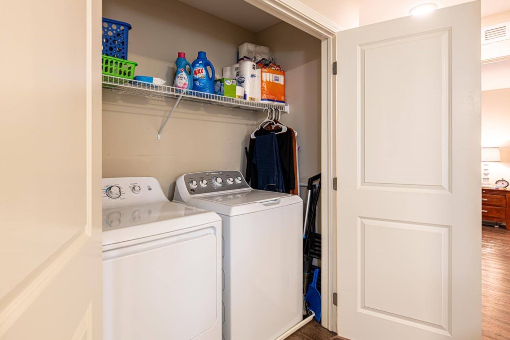 A laundry room with a washer and dryer.