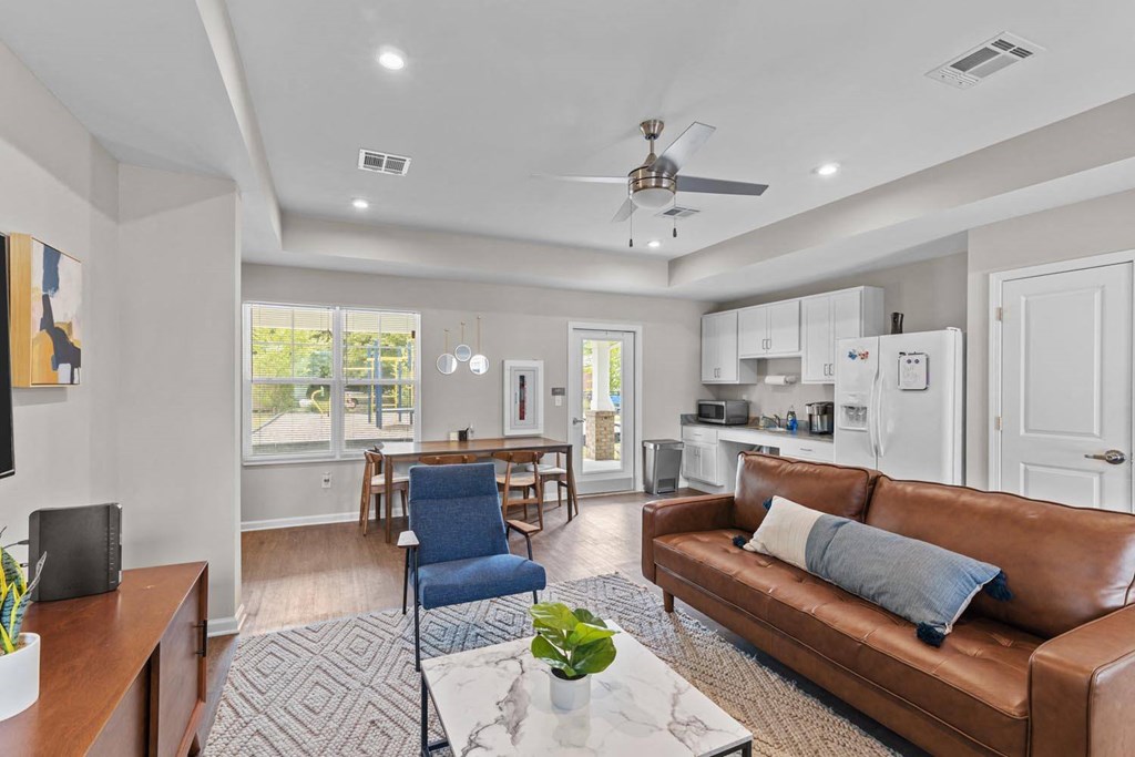 a living room with a couch and a table