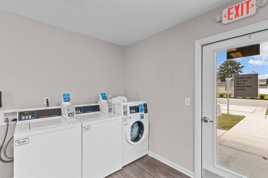 the preserve at ballantyne commons laundry room with two washing machines