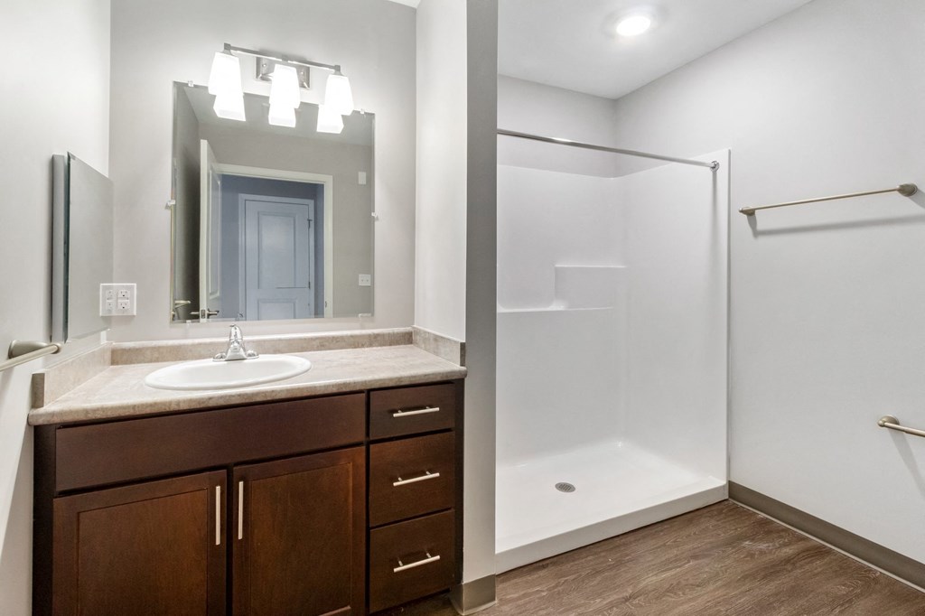 the preserve at ballantyne commons bathroom with sink and shower