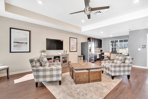 a living room with a couch and a table