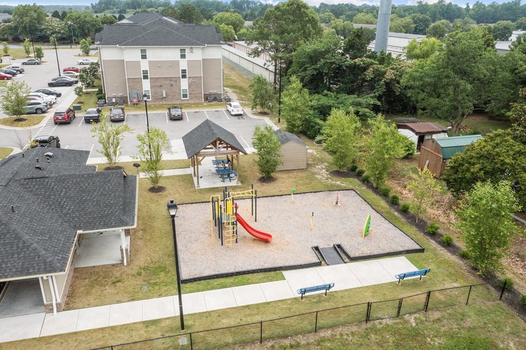 an aerial view of a playground in a park