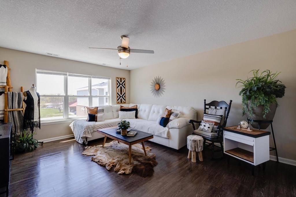 a living room with a couch and a table