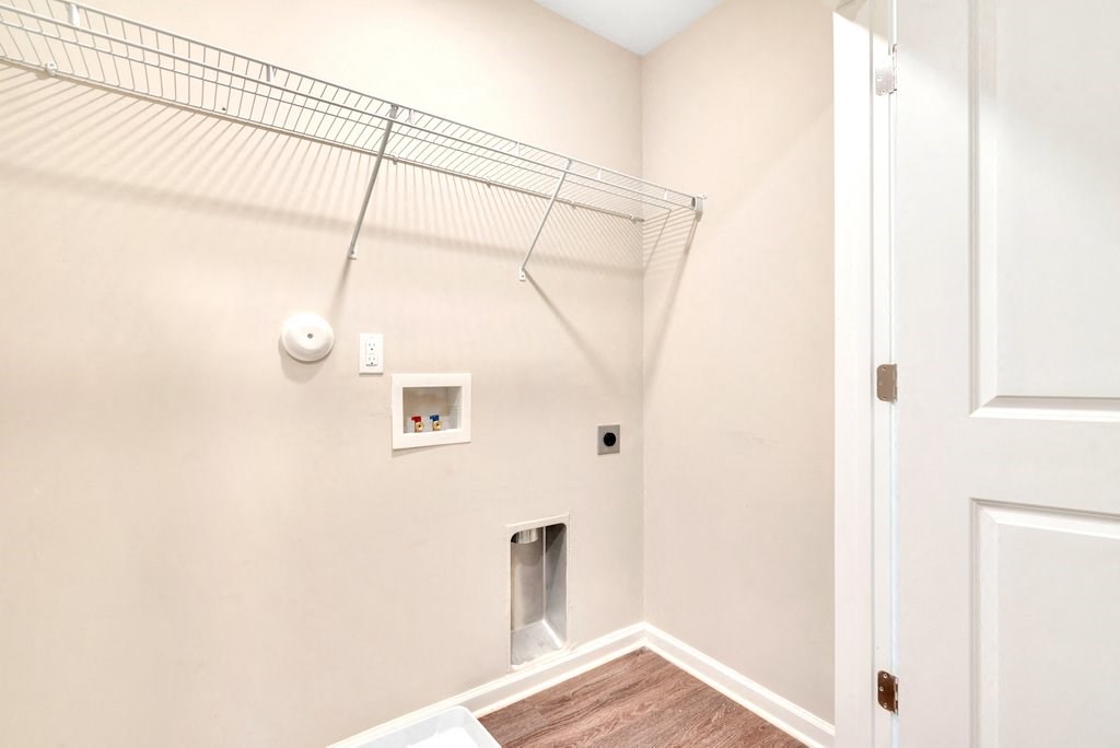a room with a closet and a shelf on the wall