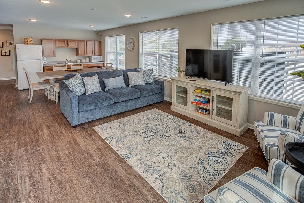 a living room with a couch and a tv