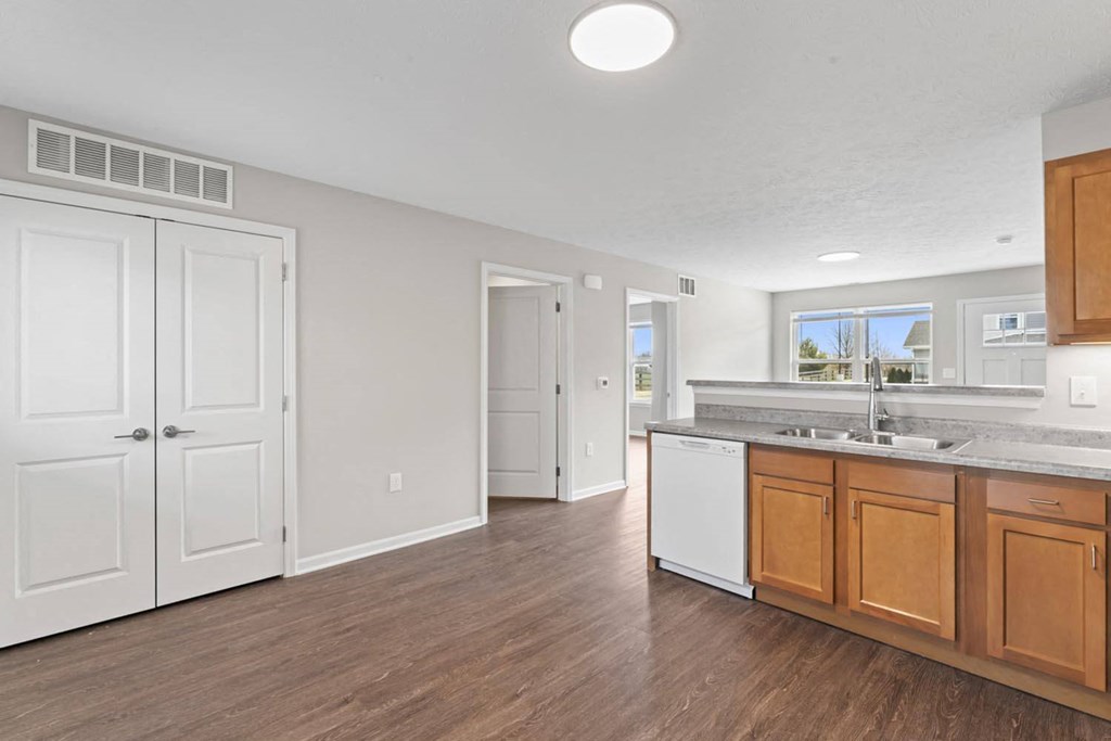 a kitchen with a counter top and a sink