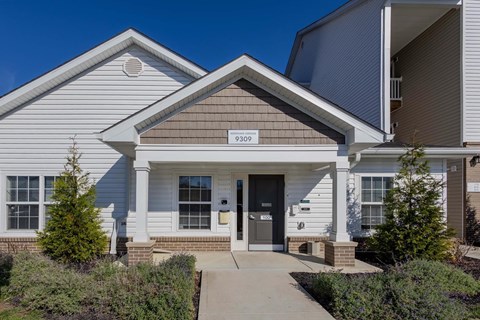A house with the number 9609 on the front door.