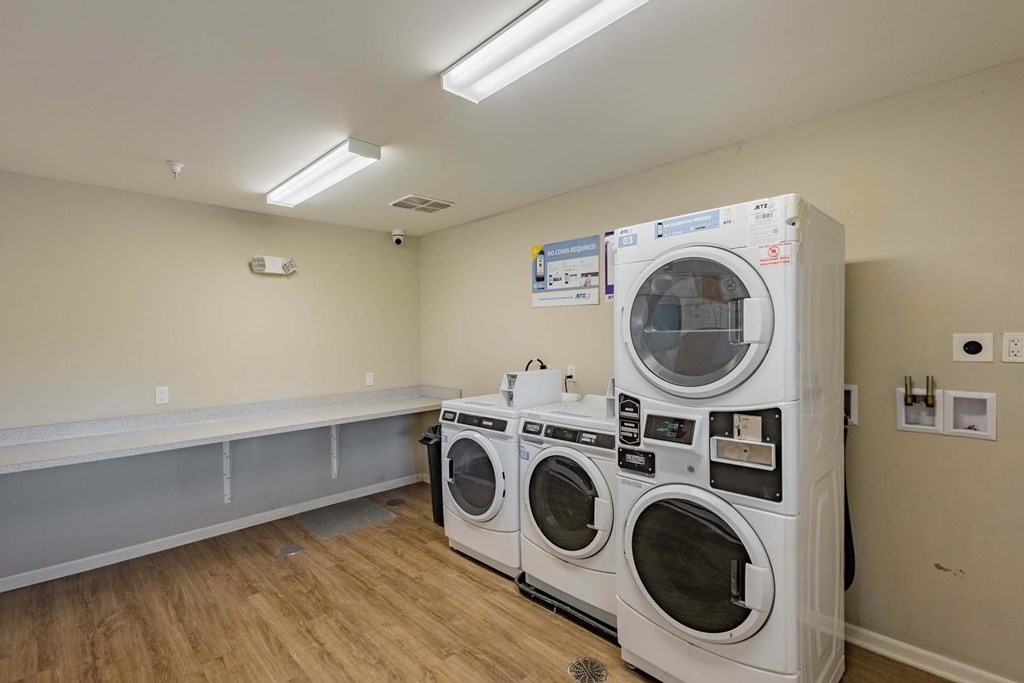 A laundry room with a washer and dryer.