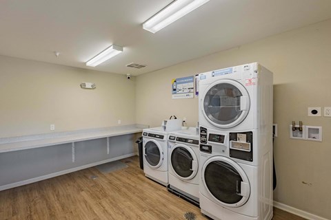 A laundry room with a washer and dryer.