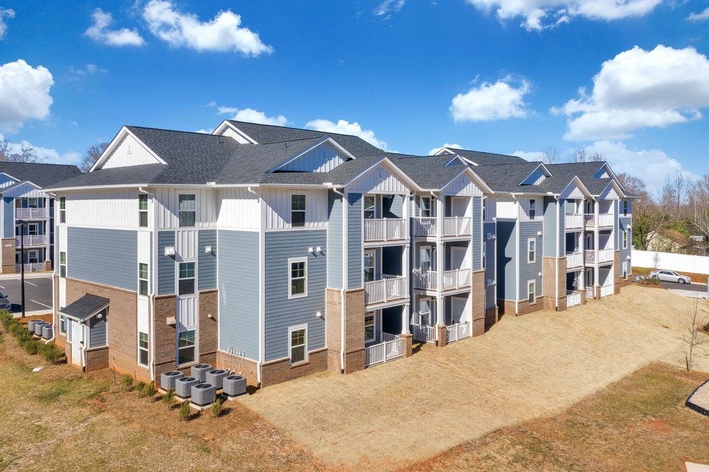 an aerial view of an apartment building with balconies