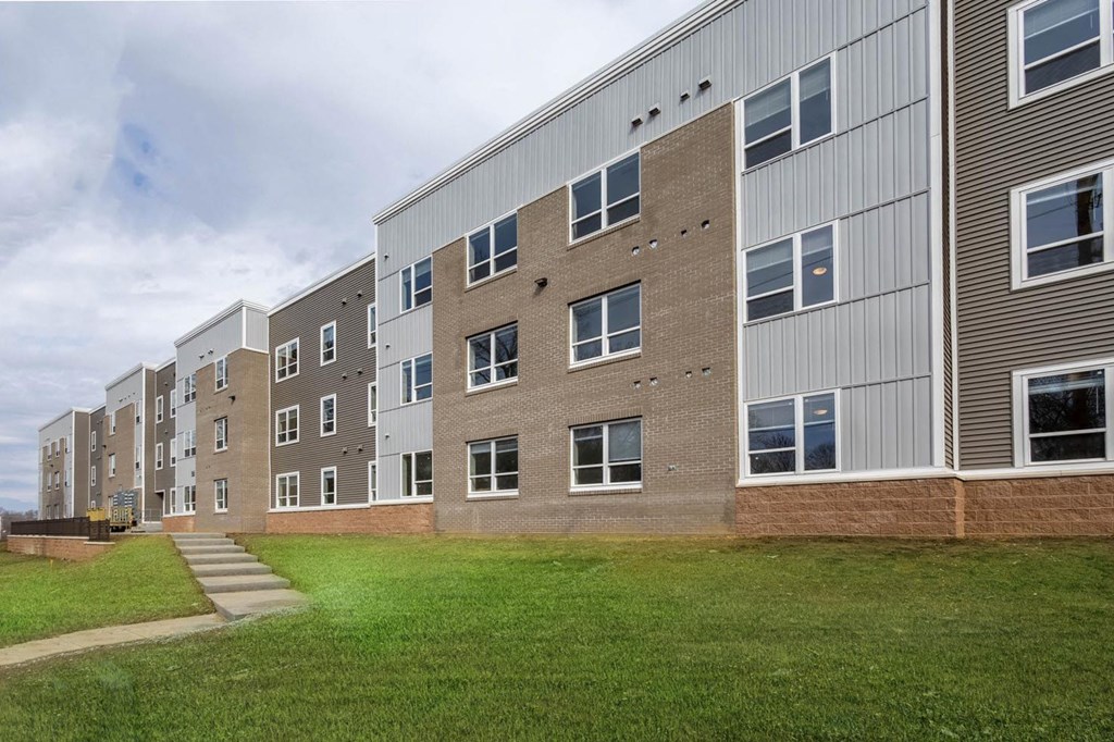 A long building with a lot of windows.