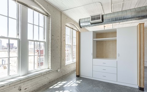 Room with white cabinets at Wheelhouse Lofts, Dayton, OH, 45402
