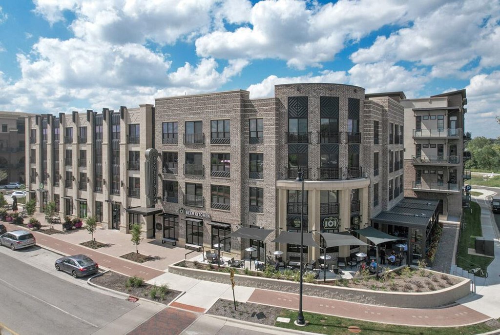 A large building with a lot of windows and a sign that says 101.