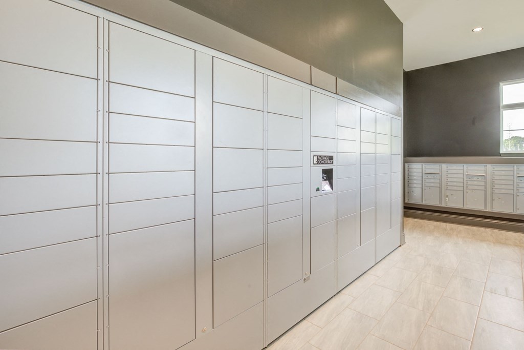 package locker room with green wall paint and tile floors