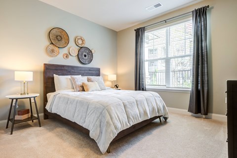 Spacious apartment bedroom with natural light at Argento at Riverwatch Apartments in Augusta, GA