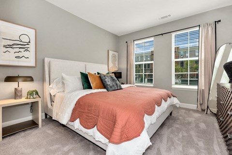 Spacious apartment bedroom with modern finishes at Argento at Oakland Springs in Madison, AL