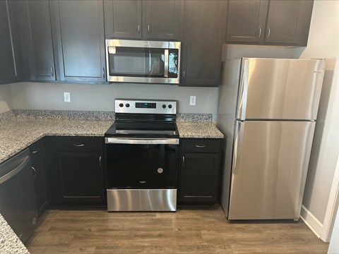 Kitchen with stainless steel appliances at Ascent at Mallard Creek Apartment Homes, Charlotte, NC