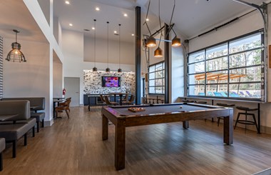 Clubhouse, pool table, tv and seating area