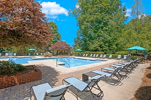 Resort-style swimming pool with pool deck and lounge seating at Elevation 3505 apartments in Atlanta, GA