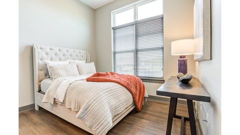 Spacious apartment bedroom with natural light at VER at Proscenium in Midtown Carmel, IN