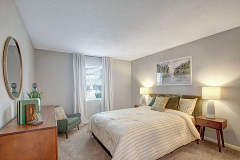 Spacious apartment bedroom with carpet at Pinewood at National Hills Apartments in Augusta, GA