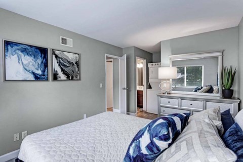 Spacious primary bedroom with natural light at Ridgewood Apartments in Grand Rapids, MI