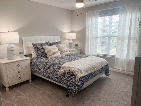 Spacious apartment bedroom with natural light at Seaside Grove Apartments in Myrtle Beach, SC
