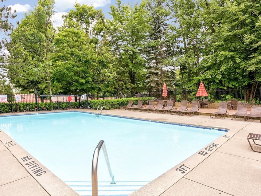 Outdoor Swimming Pool at Timber Ridge Apartments in Wyoming, MI - Photo Gallery 1