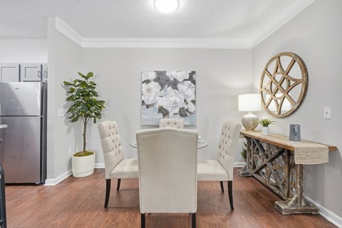 Apartment dining area with open living space at The Glen at Alexander in Augusta, GA