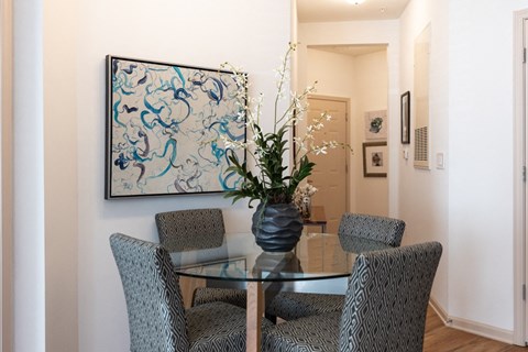 Apartment dining area with contemporary finishes and open-concept layout at The Moderne at Providence