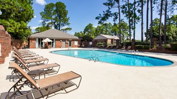 our apartments have a large pool and lounge chairs