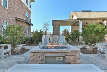 Outdoor Firepit at Argento at Riverwatch Apartments in Augusta, Georgia Outdoor Firepit-1, 2, and 3 bedroom apartments-Argento at Riverwatch Apartments in Augusta, Georgia - Photo Gallery 4
