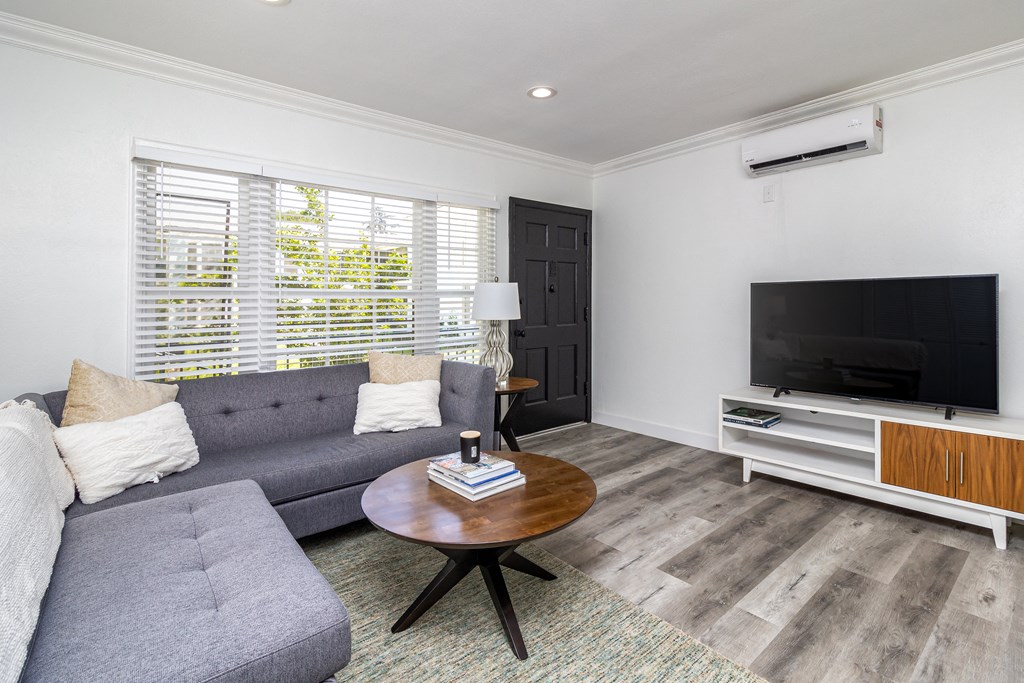 a living room with a couch and a coffee table
