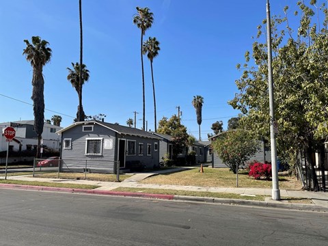 A house with a red stop sign in front of it.