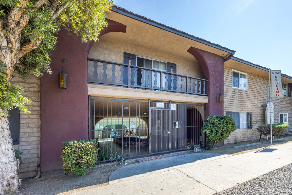 a building with a gate in front of it