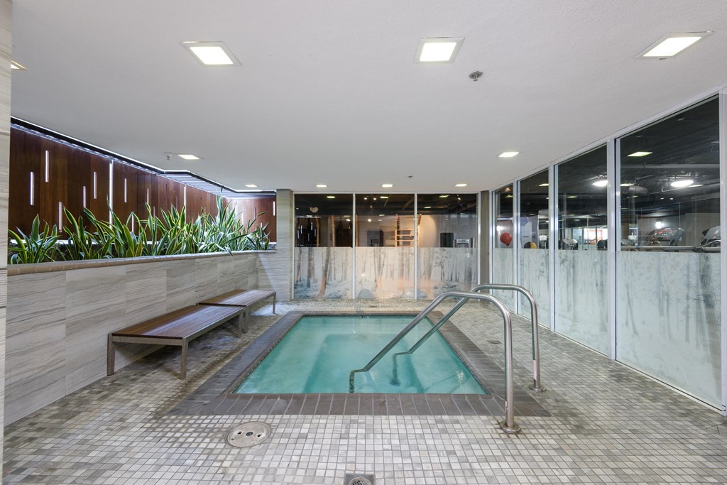 a hot tub in the lobby of a building