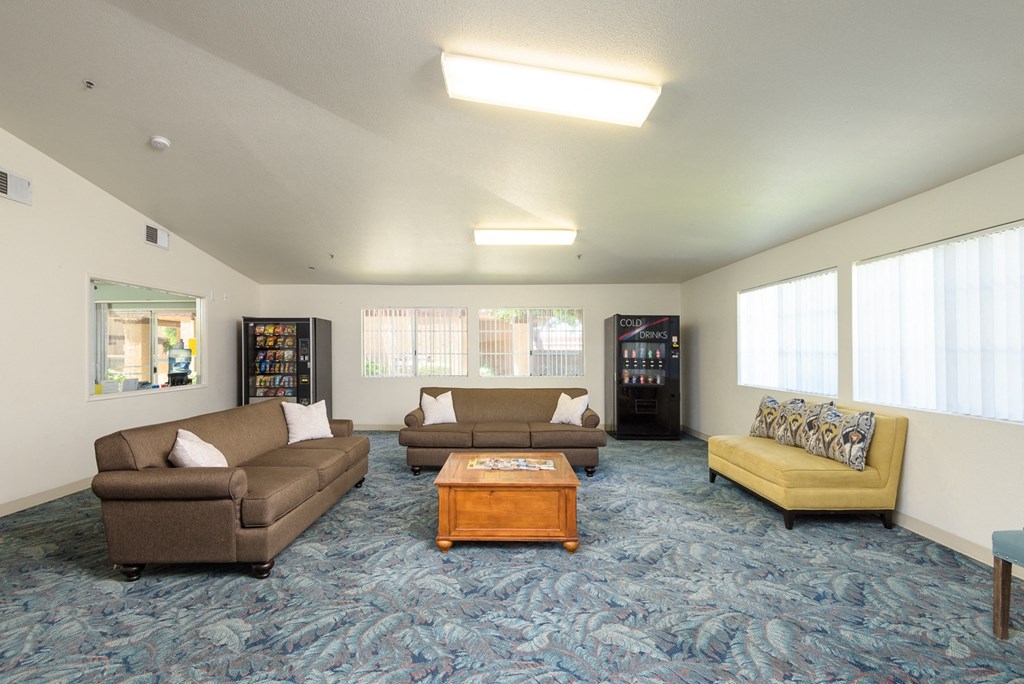a living room with couches and a coffee table