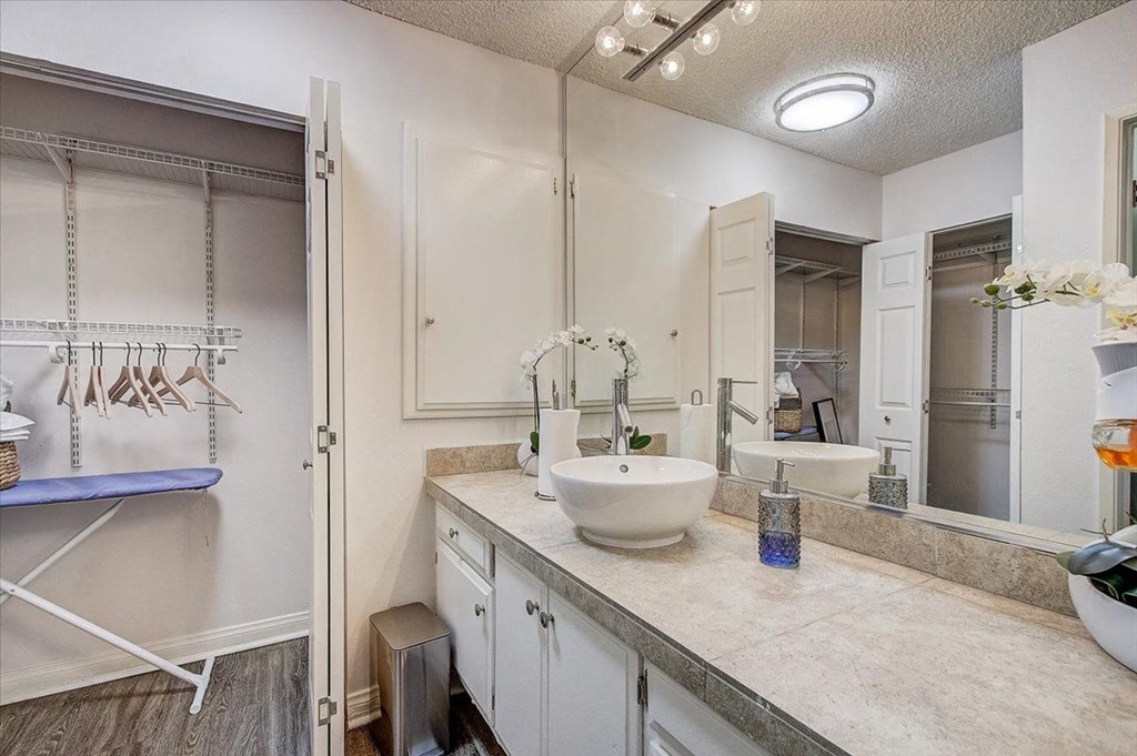 a bathroom with a sink and a mirror