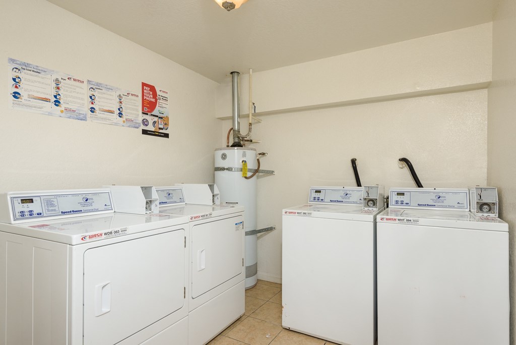 A laundry room with a washer and dryer.