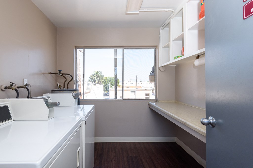 this is a photo of the laundry room in a 1 bedroom apartment at deer hill apartments in