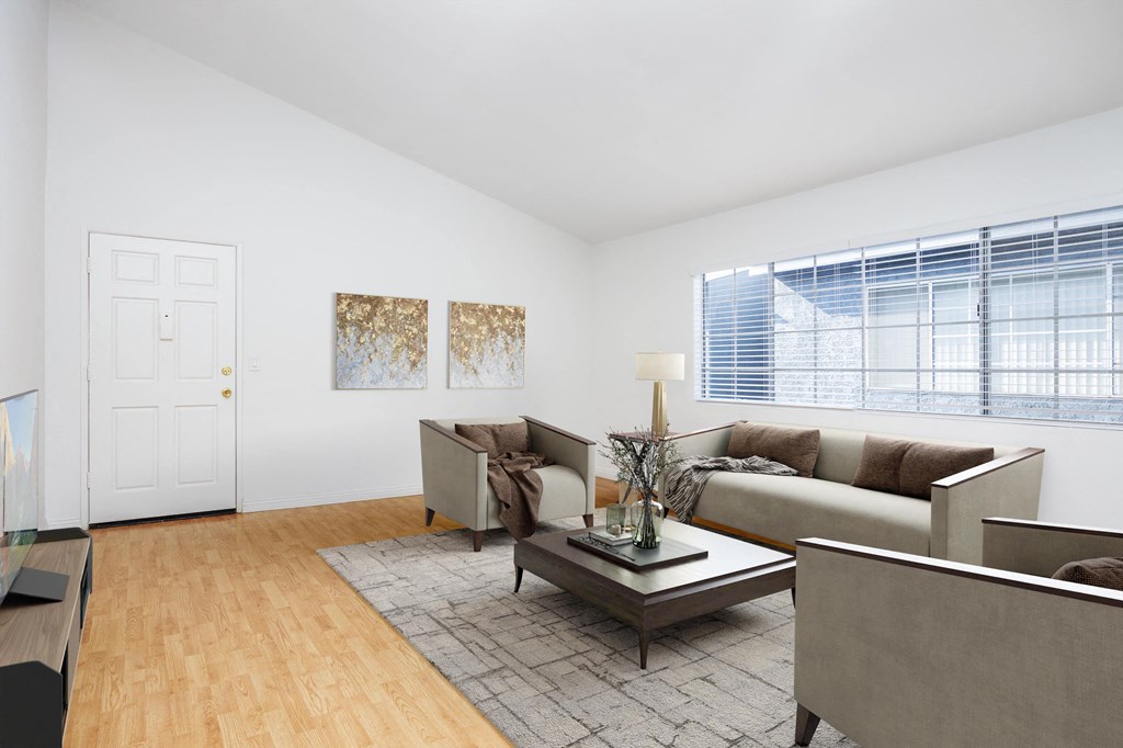 a living room with a couch and a coffee table
