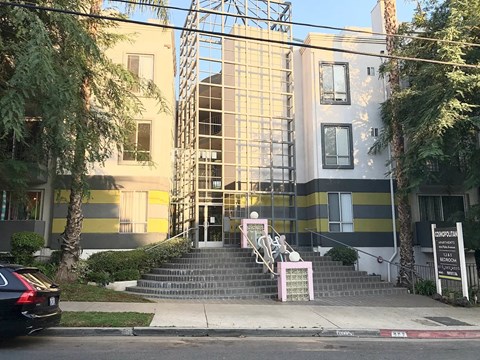 A building with a yellow and black striped facade.