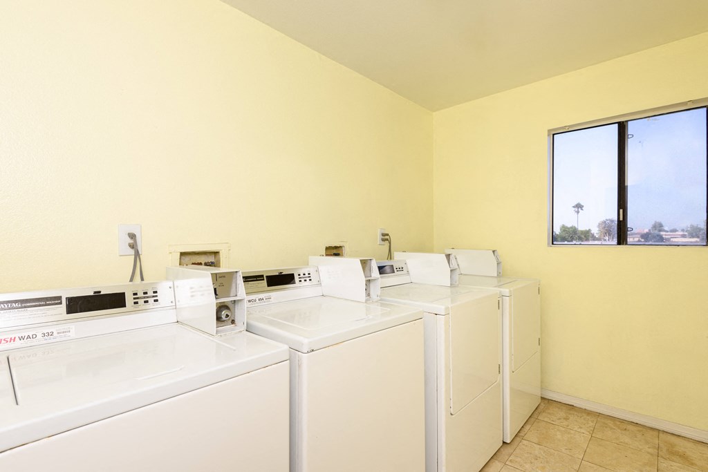 a washer and dryer are available in the laundry room