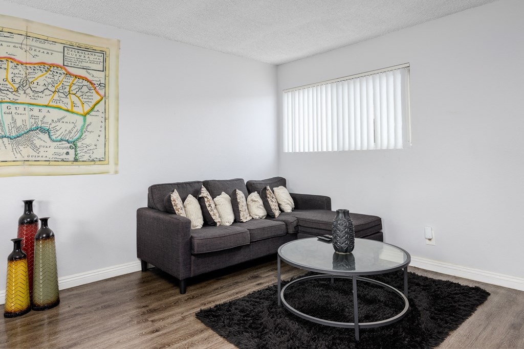 a living room with a couch and a coffee table