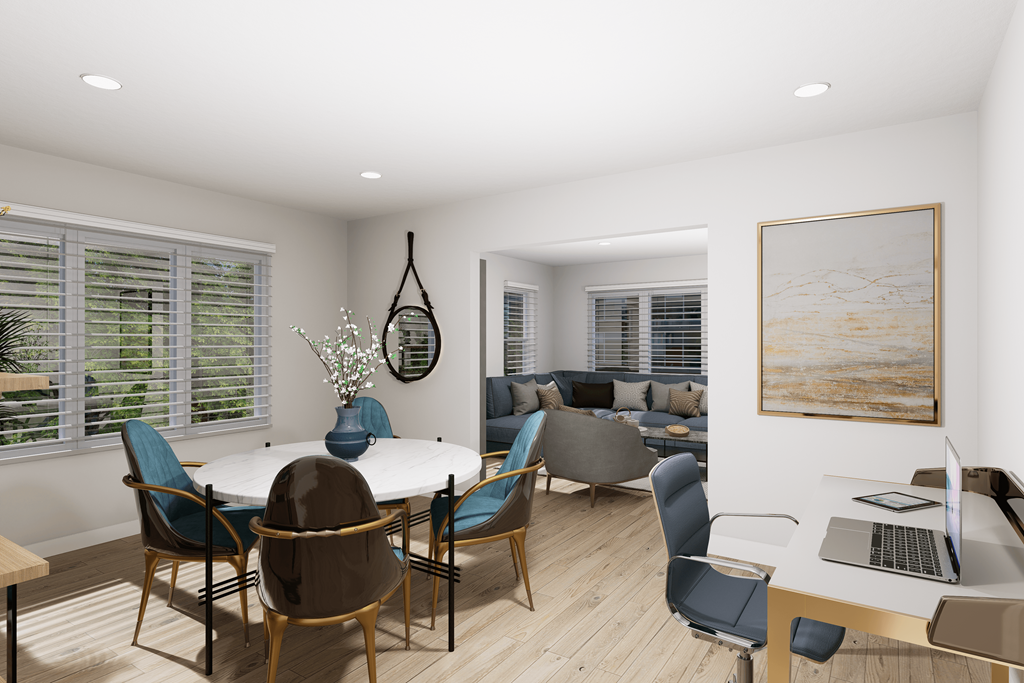 a living room and dining room with a table and chairs