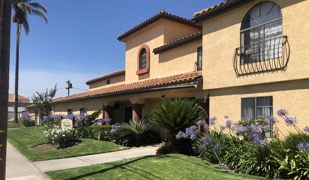 a house with a garden in front of it