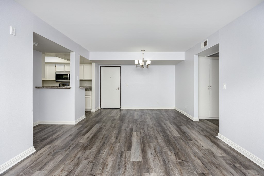 A room with a grey floor and white walls.